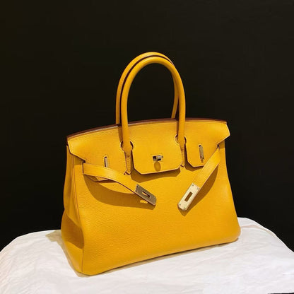 G060 Amber Yellow 9V Togo Leather