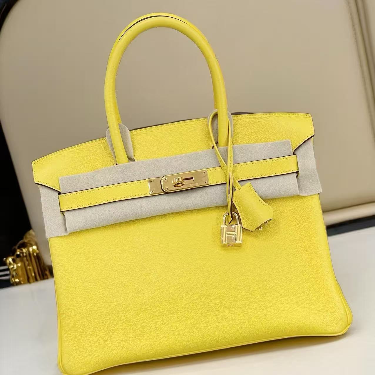 G061 Jaune de Naples 9O Togo Leather