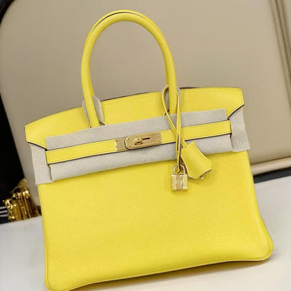 G061 Jaune de Naples 9O Togo Leather