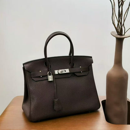 G013 Ebene 46 Togo Leather