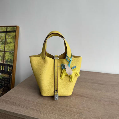 G061 Jaune de Naples 9O Togo Leather